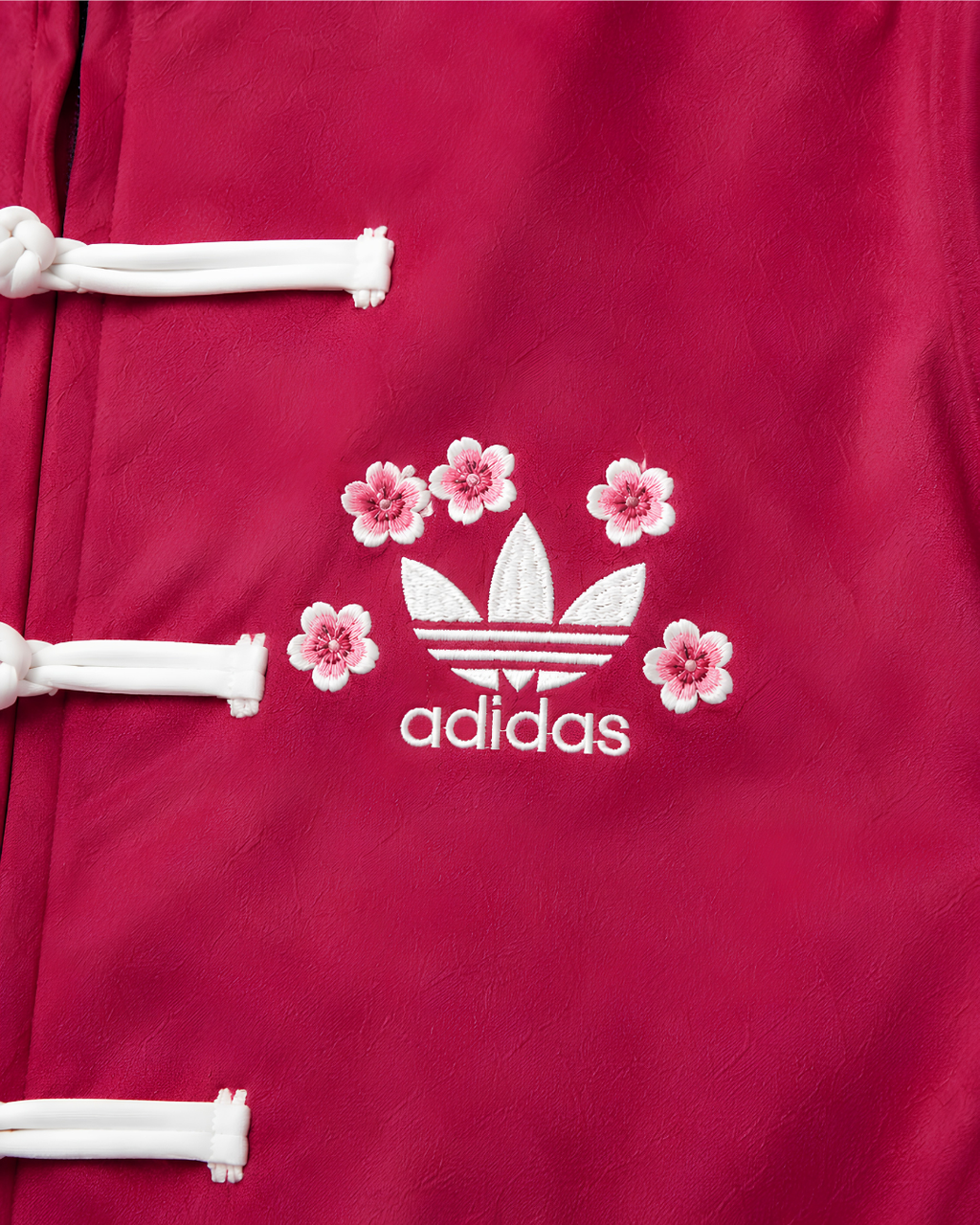 Sakura-Inspired Pink Velvet Chinese Collar Track Cny Jacket with Floral Embroidery.