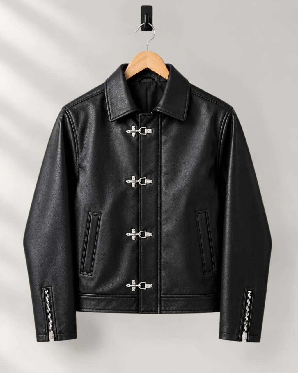 Black boxy streetwear jacket with metal clasp