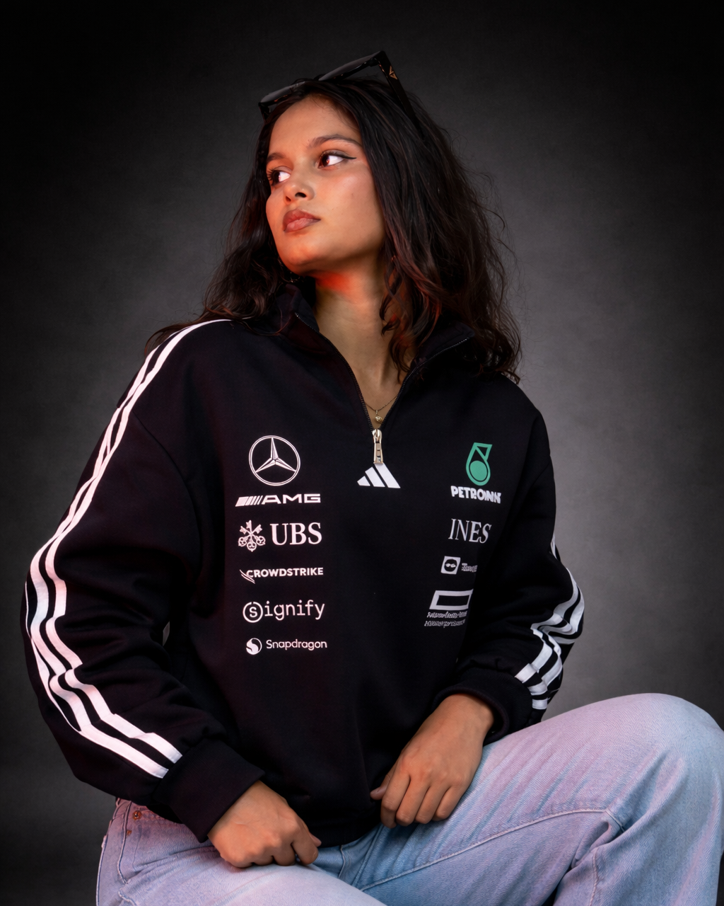 Petronas inspired black half zip sweatshirt front view with racing style design and premium streetwear fit