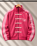 Female model wearing premium pink CNY jacket with Mandarin collar and frog buttons.