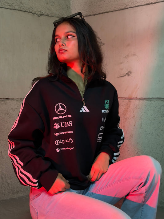 Petronas inspired black half zip sweatshirt front view with racing style design and premium streetwear fit