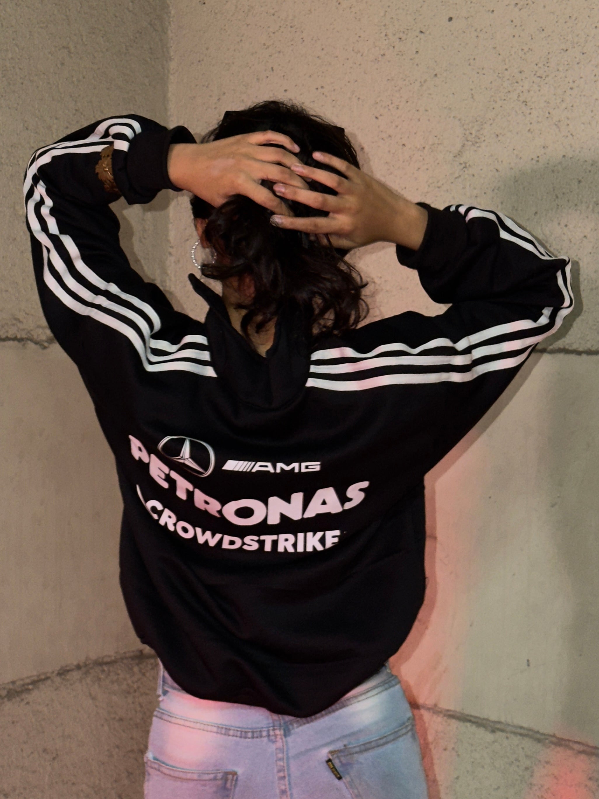 Back view of Petronas inspired black half zip pullover featuring motorsport inspired detailing and modern streetwear look