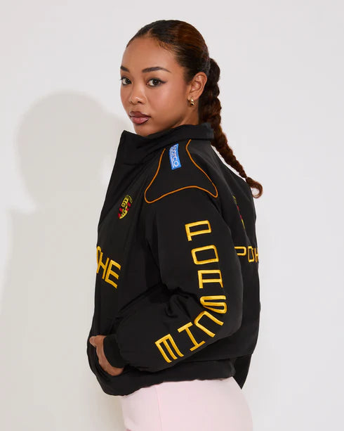 Black parachute puffer jacket inspired by Porsche racing aesthetic, warm sporty streetwear design